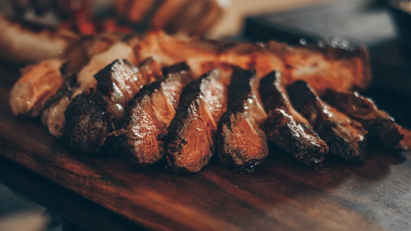 Seared steak, sliced and plated